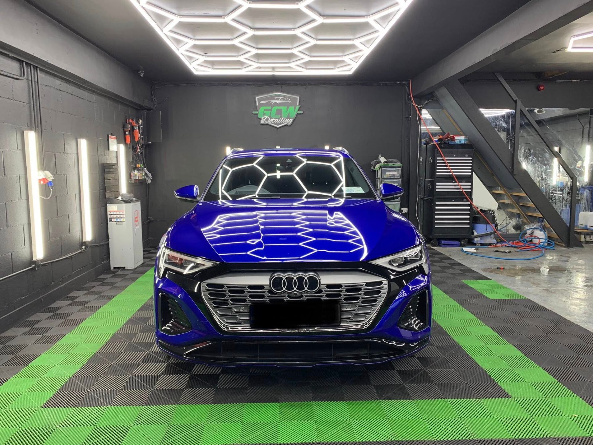 Audi e-tron under the GCW honeycomb lighting